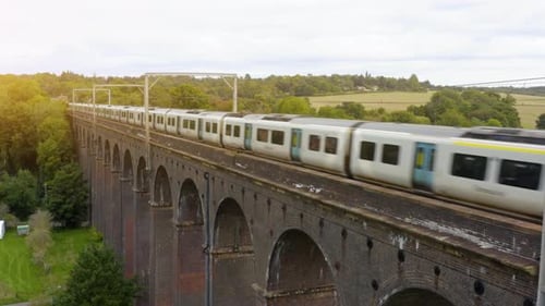 Aerial view of a moving train along the Viaduct.