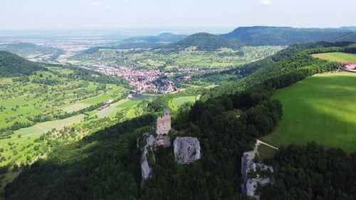 flight towards castle ruins, opening view