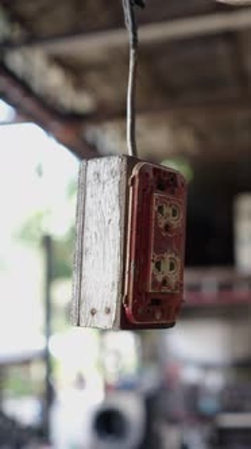Hanging Socket in an Industrial Plant Back Lit FHD Vertical Video
