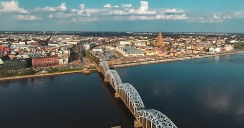 Aerial shot of a railway bridge over river Daugava in Riga, Latvia, Baltic states, eastern Europe. S