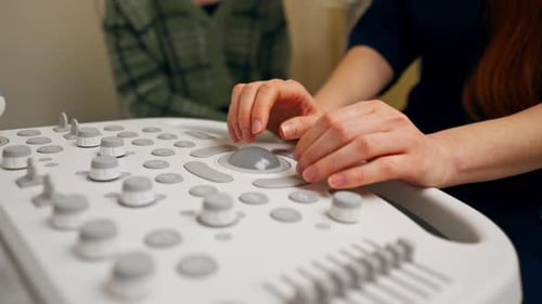 Closeup the Clinic Gynecological Office Ultrasound Machine Doctor Analyzes and Records