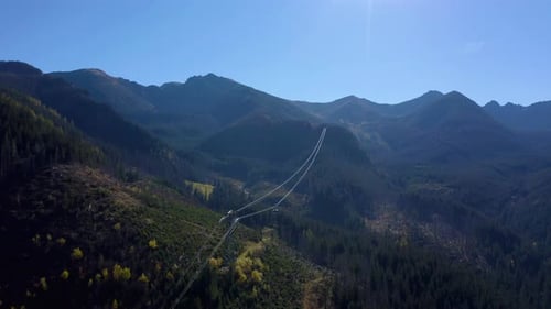 Lift cabins in a mountain ski resort. The movement of ski lifts.