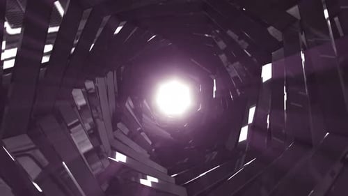 A rotating dark metal tunnel with walls of ribs and lines in the form of a hexagon with reflections
