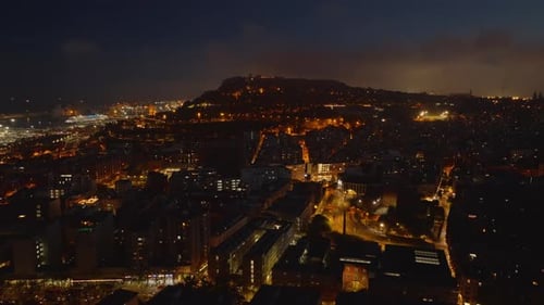 Night Cityscape with Glowing Harbour in Backgrounds Aerial View of Metropolis in Evening Barcelona