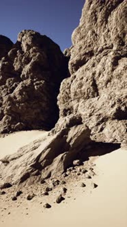 Giant Rock Formation Amid Desert