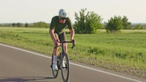 Sportsman Doing Regular Bike Riding Exercise Outside City