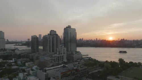 The sun begins to set along Brooklyn's waterfront