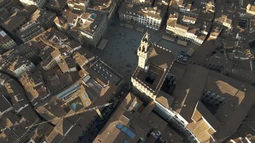 Aerial view of historic rooftops and architecture, Italy.