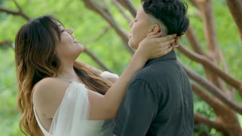 Romantic Couple Embracing Tenderly in a Green Park