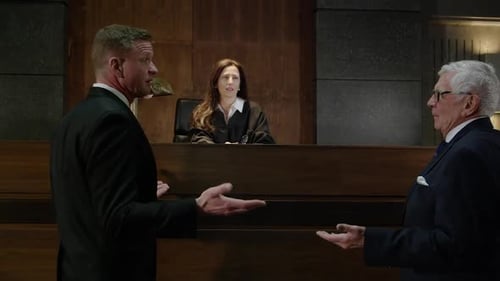 Two Lawyers Argue in Courtroom in Front of Judge