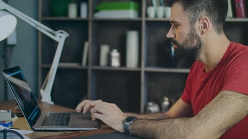 Student Searching Internet on Laptop in Office. Businessman Working on Laptop Pc