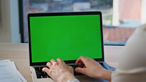 Businesswoman Hands Typing Green Screen Computer at Corporate Workplace Closeup