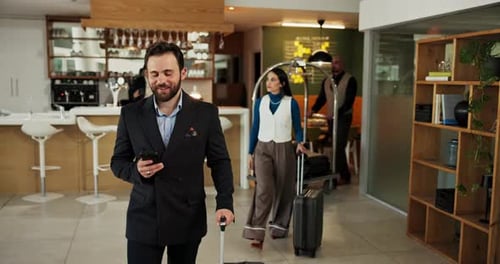 Hotel, businessman and luggage with smartphone for walking, professional communication and check in
