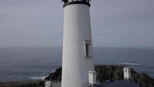 Close Up of a Lighthouse on the Seashore at Sunset
