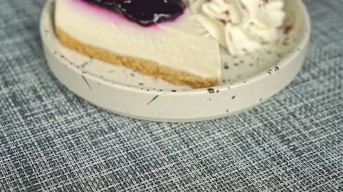 Blueberry Cheesecake Slice with Whipped Cream Dessert