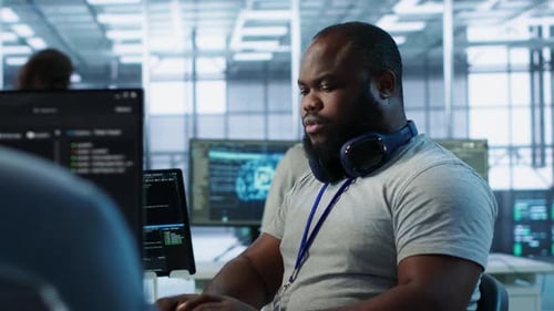 Engineer Tasked with Monitoring Data Center Supercomputers