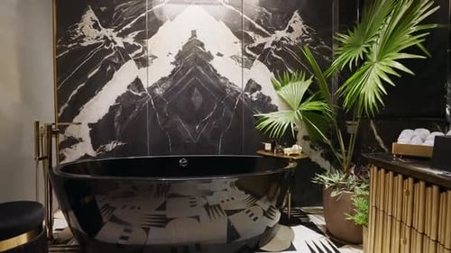 Stylish Bathroom with Black Tub and Marble Wall