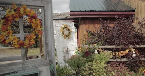 Autumn themed floral and wood décor outside for a wedding at Bean Town Ranch in Ottawa.