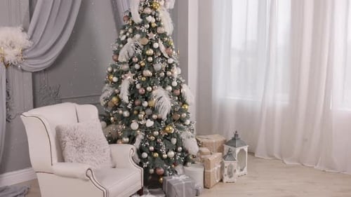 Decorated Christmas Tree and Presents in Elegant Room