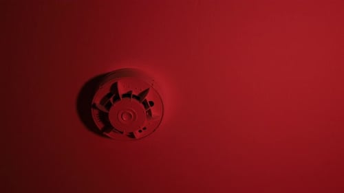 Smoke Detector on Ceiling with Moody Color Lighting