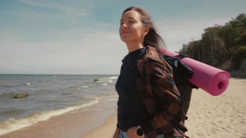Woman solo traveling in tranquil lagoon on weekends.