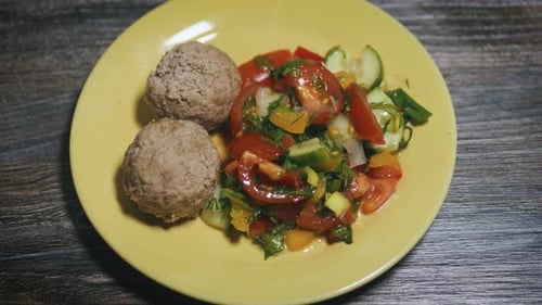 Vegetable Garden Salad with Dietary Boiled Meatballs Close Up