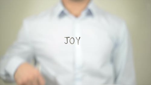 Joy Man Writing on Transparent Screen