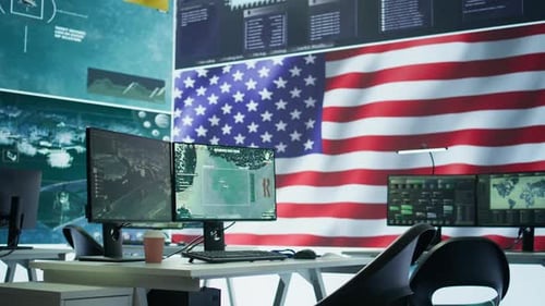 Empty Office with Computer Monitors Displaying Data