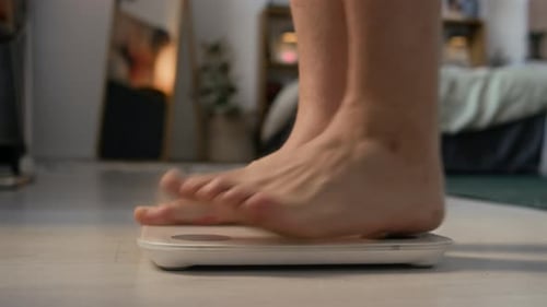 Man Checking Weight