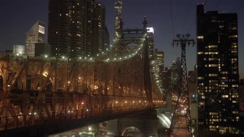 The Stunning Night View Showcasing the Queensboro Bridge Alongside the Vibrant City Skyline