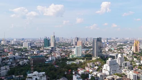 Aerial View of Expansive Bangkok City Skyline with Modern High Rise Buildings and Residential Areas