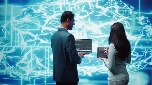 Man and Woman Discussing Digital Brain Data