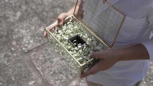 Wedding Rings Inside Glass Floral Box