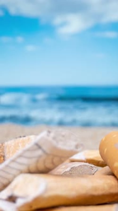 Cigarettes Butts Piling Up on Beach in Vertical Format