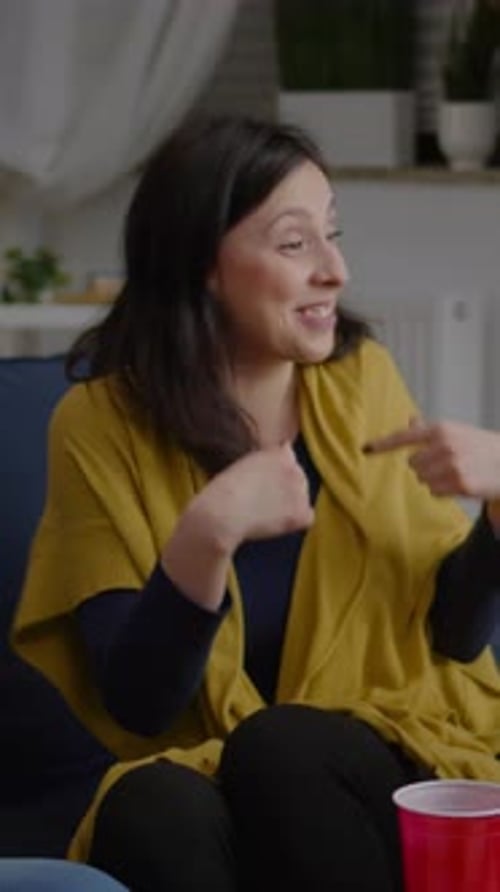 Friends Toasting Each Other with Bottled Drinks