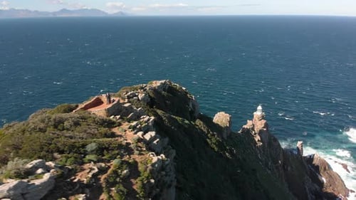 Aerial Sliding Shot of a Mountain Lookout at the Cape Point Beaches in South Africa