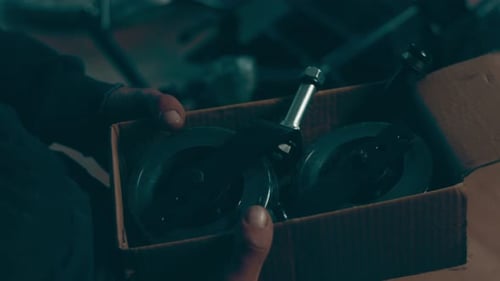 A Disabled Man Assembles a Stroller