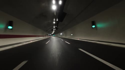 Car Driving in Tunnel on Highway