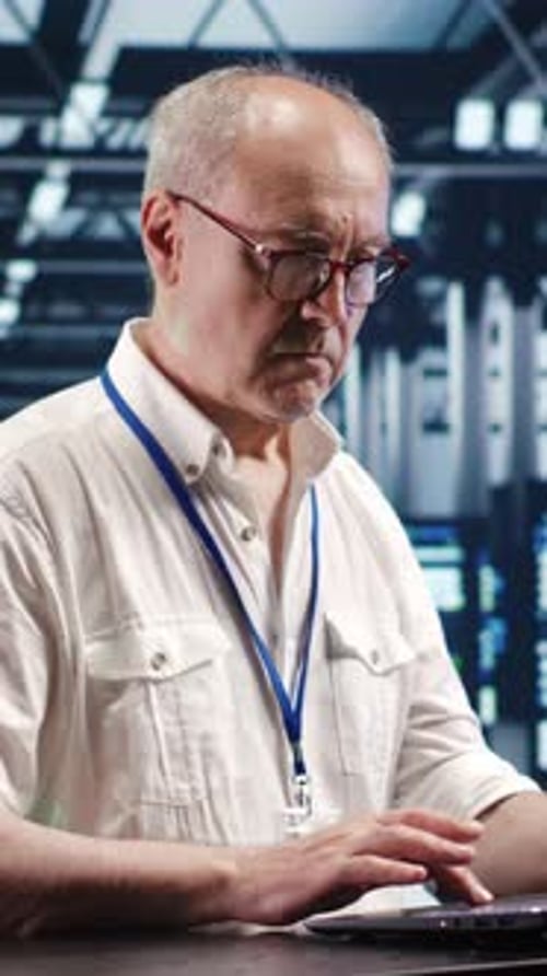 Vertical Technician Optimizing Data Center