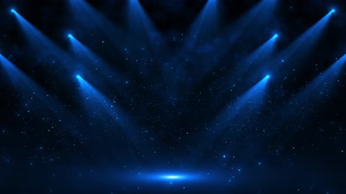 Dynamic Blue Stage Spotlights with Shimmering Particles Background