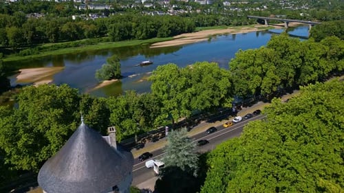 Drone reveals Tours castle and Loire river behind