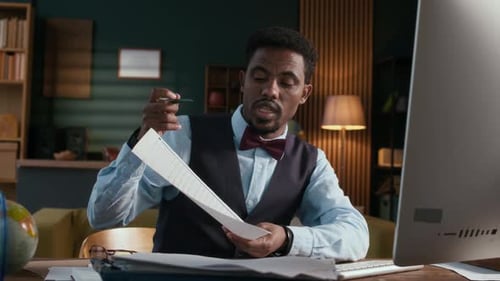 Professor Consulting Student Online on Computer from Home Office