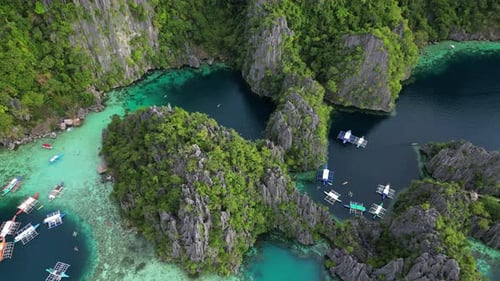 Tropical Island with Boats in Lagoons