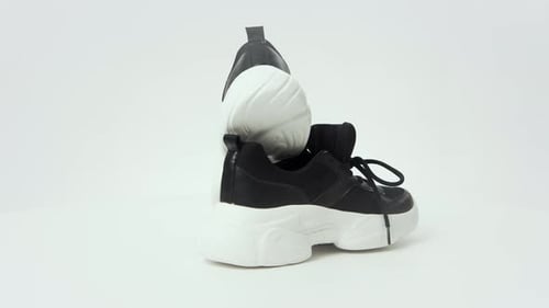 Black Athletic Shoes with White Chunky Soles Rotating