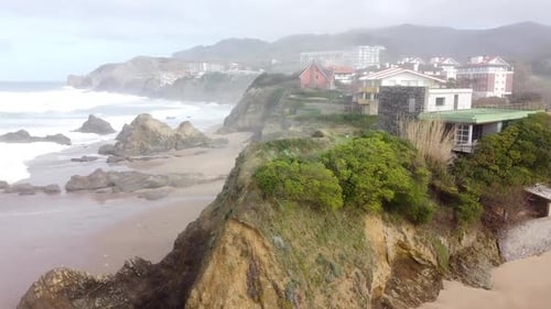 Aerial drone view of the beach of Bakio in the Basque Country in a foggy day
