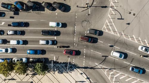 Slow Turning Shot Above of Road with Moving Cars