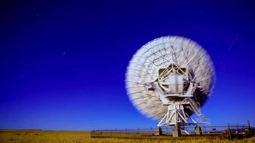 Radio Telescope Antenna Rotating at Night Time Lapse