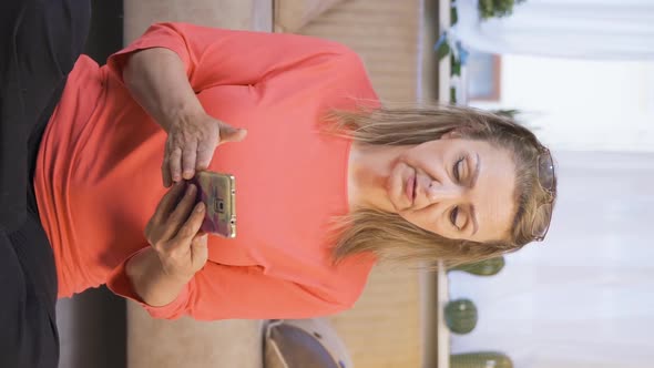Vertical video of Hesitant woman., People Stock Footage ft. facebook ...