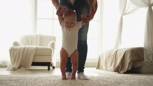 Baby Learning to Walk with Assistance Indoors