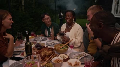 Friends Gather Together to Celebrate Evening Dinner